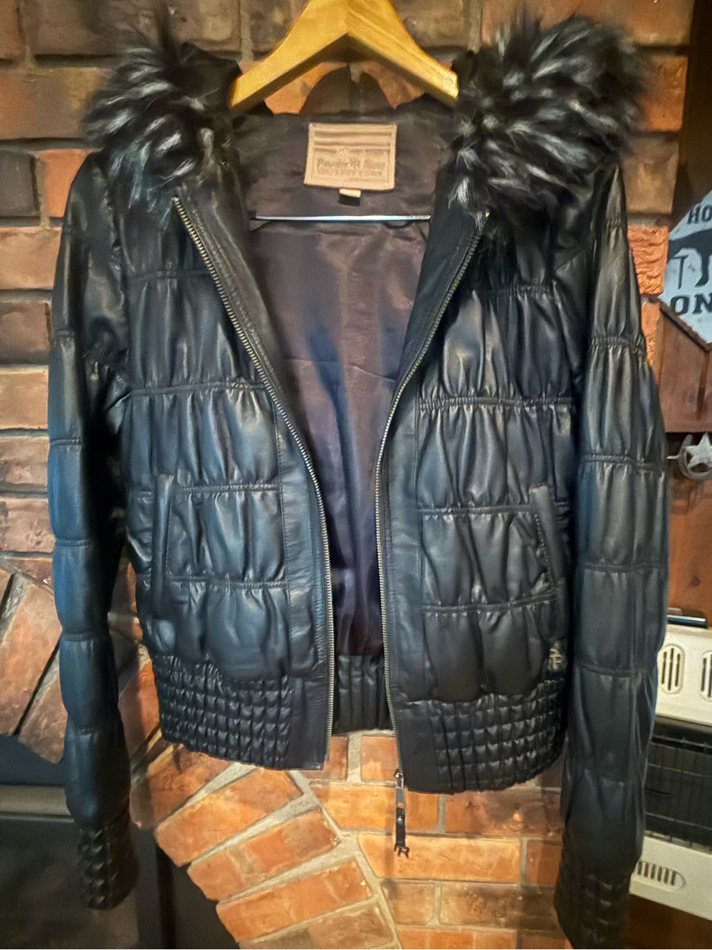 Beautiful sz medium “Powder River” hooded black leather jacket. New without tags